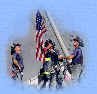 Firemen raise the flag after the 9-11 attack on the World Trade Center.